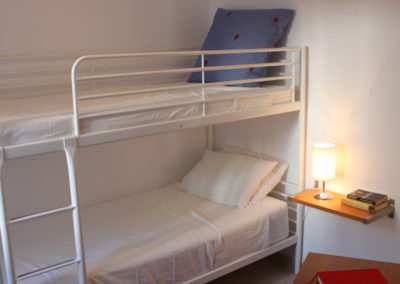 R14 - Bedroom with bunk beds.