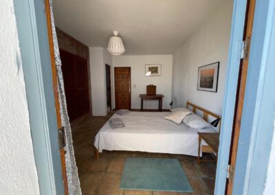 G408 - bedroom 2 with open door to the terrace downstairs